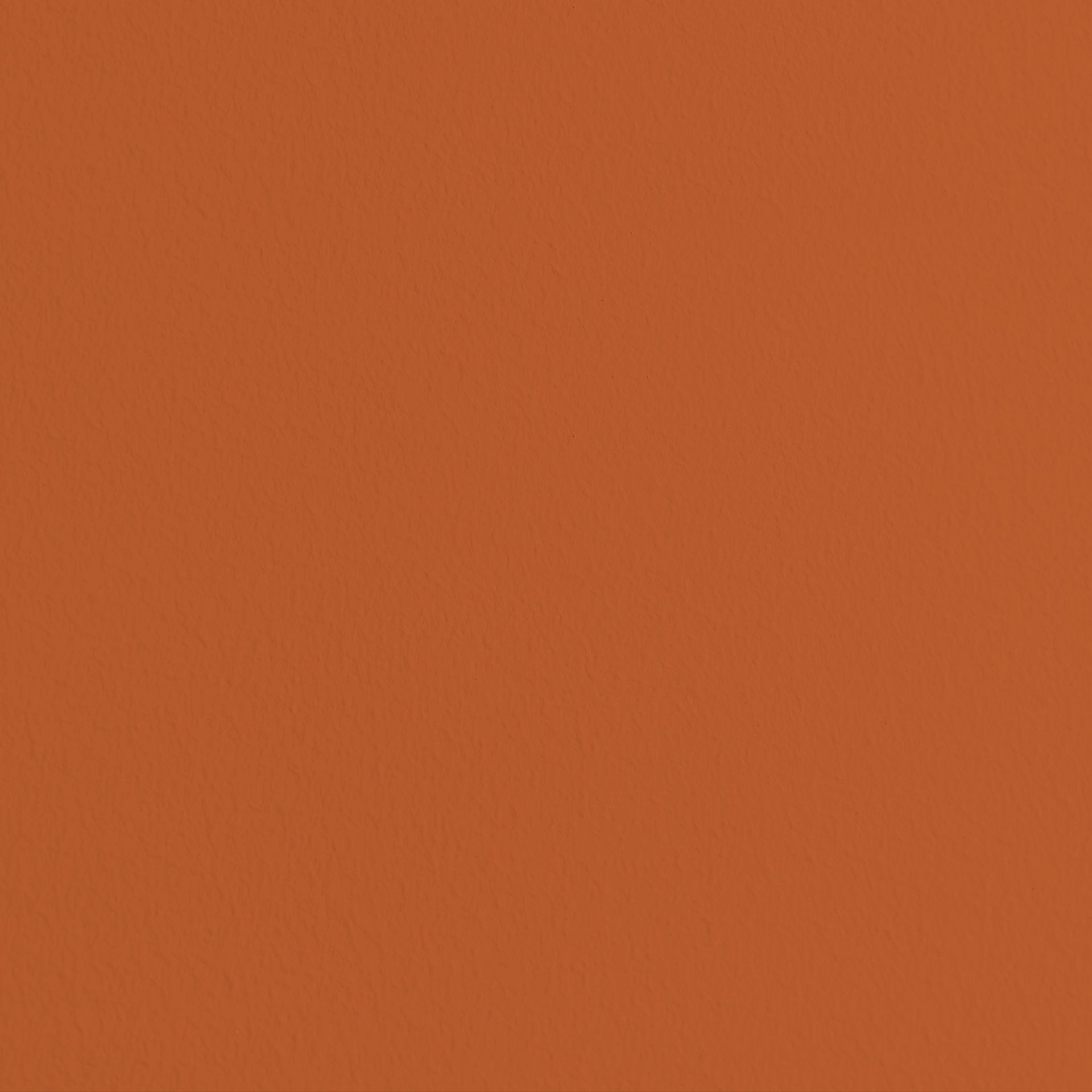 Farbenvorschau-Bild: Nahaufnahme einer Wandfläche gestrichen mit MissPompadour Orange mit Lava